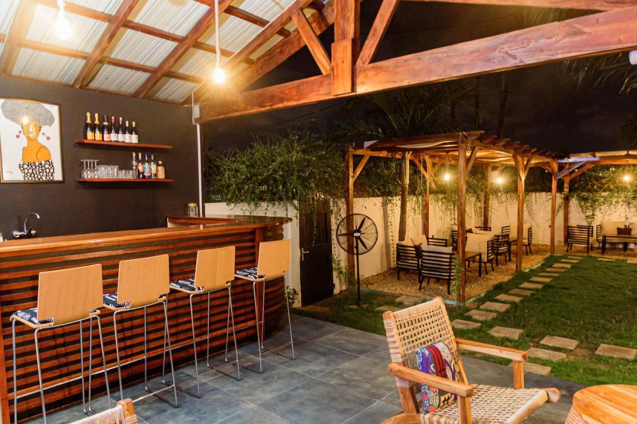 Ahome Guest House & Lounge Ломе Экстерьер фото